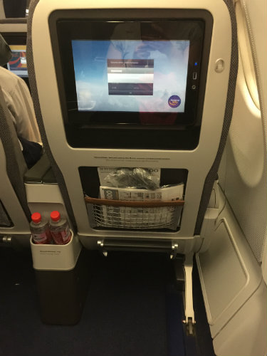 Moveable armrests are cleverly located on each side of the seat.