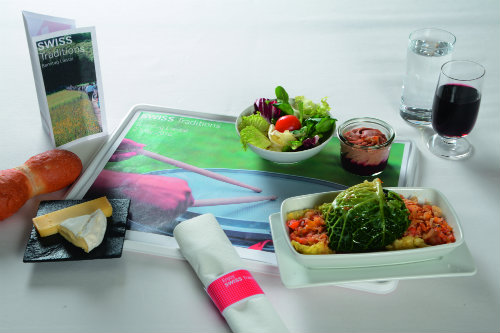 Entree, Marinated prawns, served with greek salad and a selection of bread.