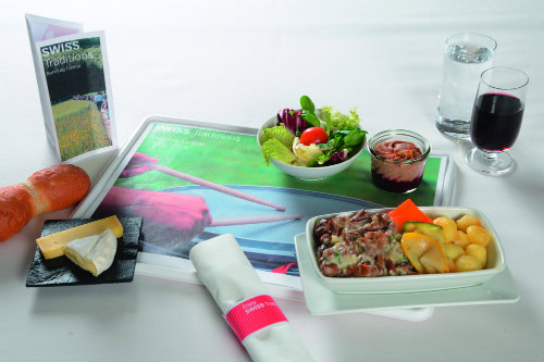 Slippers and noise cancelling headphones onboard Singapore Airlines.