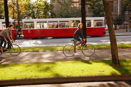 Vienna cyclists and tram