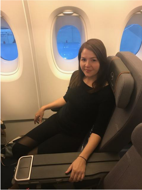 Michelle enjoying the extra space in Premium Economy.