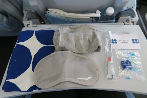 Finnair Economy Comfort passengers receive noise cancelling headphones and a Marimekko Amenity Kit