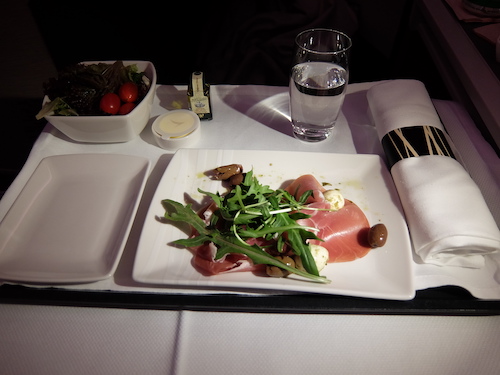 Cathay Pacific Business Class Dining: Course 1 Prosciutto Salad.