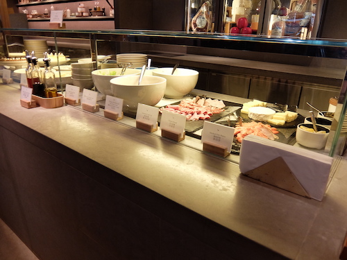 A selection of cold meat, salads and cheeses available.