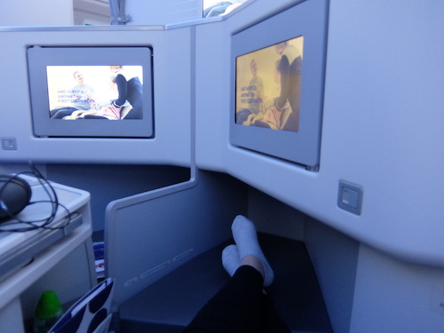 Middle seat screens when locked in place