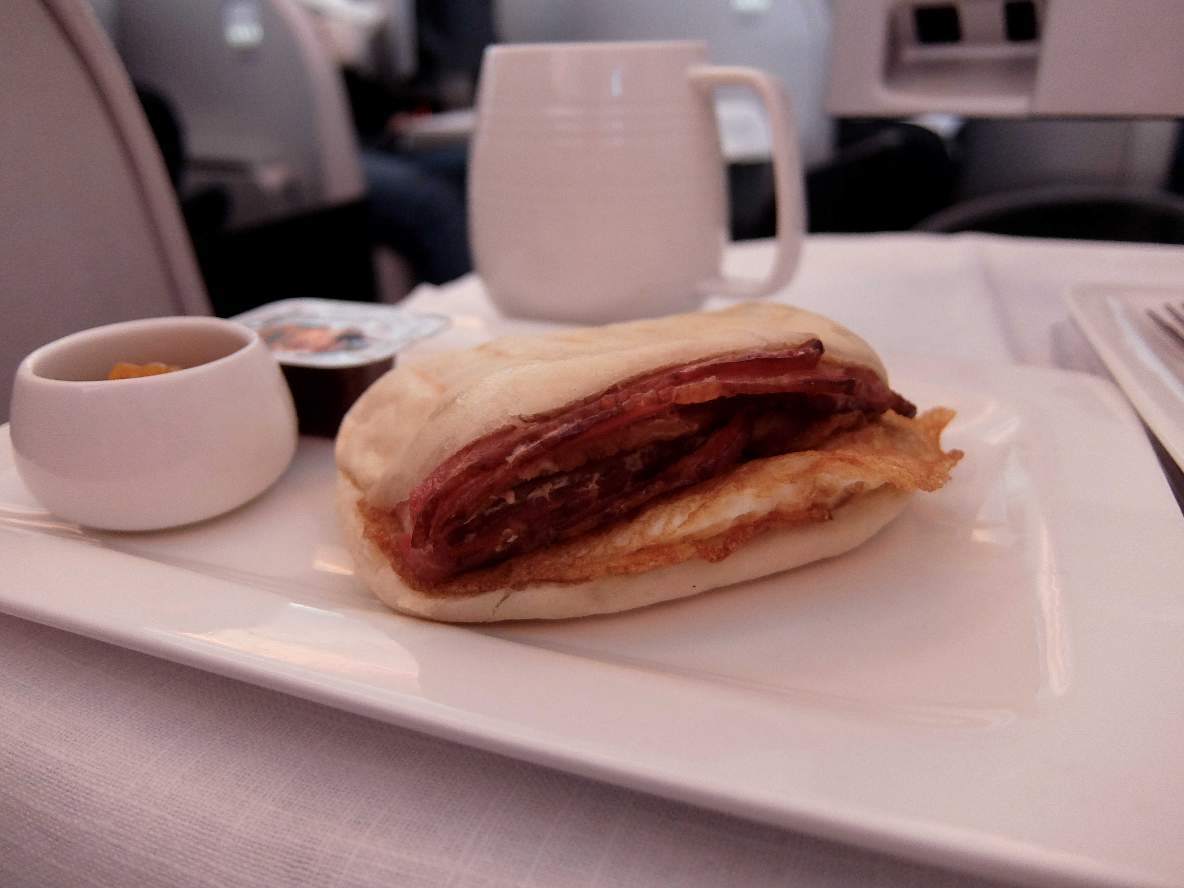 Bacon and Egg panini onboard Air New Zealand Business Class.