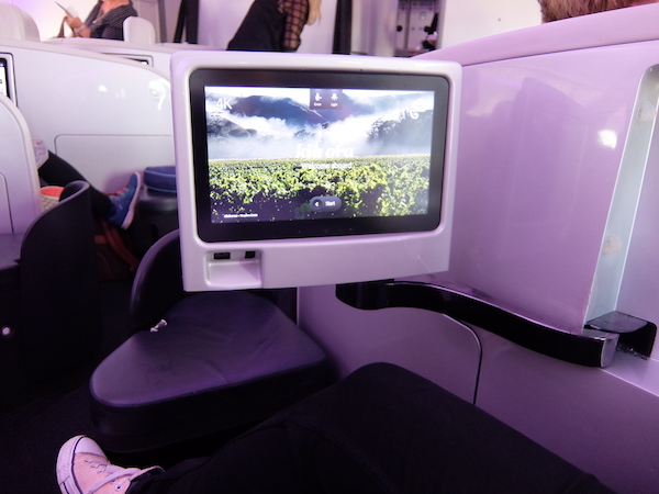 Your personal entertainment screen can be moved to your preferred viewing position.