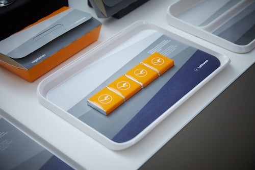 New onboard tableware featuring yellow accents.