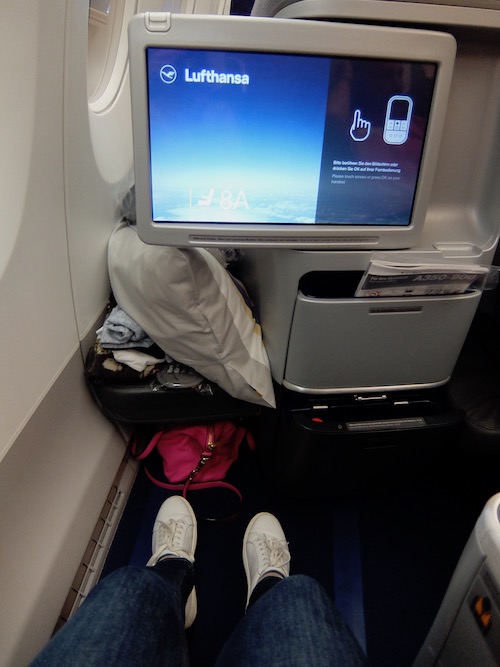 Storage for a bag under the footrest and bedding on top, with plenty of leg space.