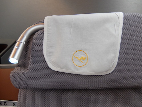 Adjustable reading light built into the seat.