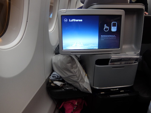 The entertainment screen slides to be in position over your bed.