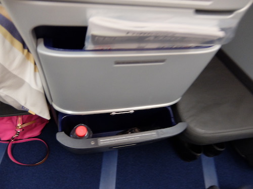 Two storage compartments for magazines etc