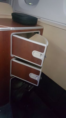 Storage within the first class seat.