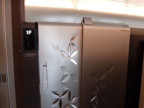 Singapore Airlines Suite with the door closed.