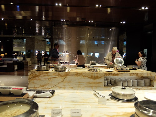 Buffet meals, drinks fridge and a fully stocked bar are available for lounge guests.