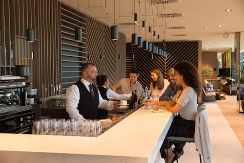A staffed bar and onsite barista in the Star Alliance Rome Lounge