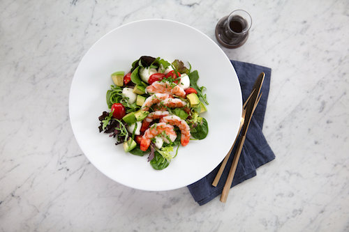 Avocado Caprese Salad, served in the United Airlines Polaris Lounge Houston.