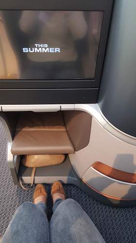 Leg room, footrest, and storage