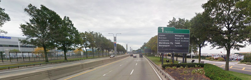 Arrive to JFK by Taxi or car with Terminal signage
