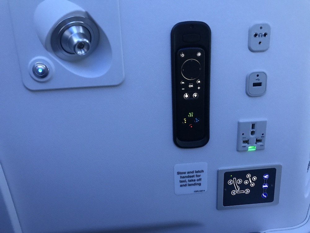 Entertainment & Seat Controls, reading light, and connectivity port are conveniently located.