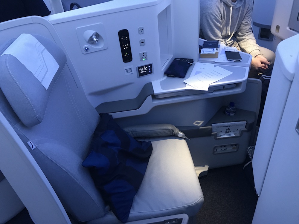 Finnair's business class cabin features navy blue Marimekko soft furnishings.