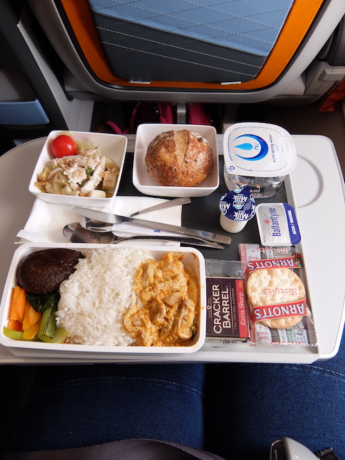 Meal after takeoff - Chicken Terrine, with salad. Oriental chicken rice, with black mushrooms, Chinese greens and rice