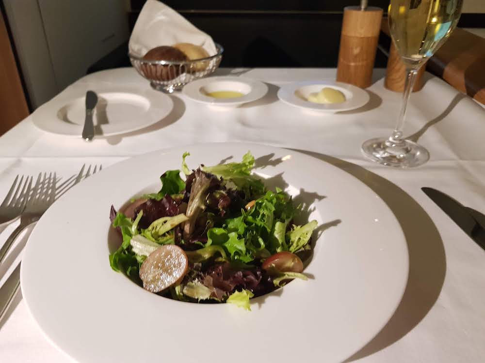 SWISS First Class Inflight Dining - First Course: Seasonal salad with grapes and toasted pine nuts