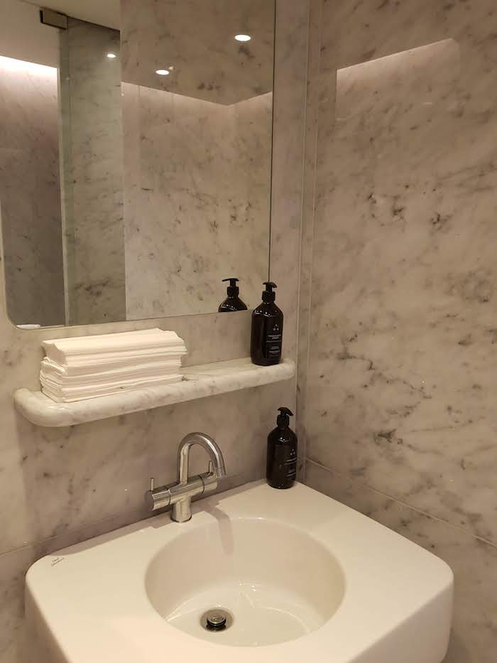 Marble clad shower suites